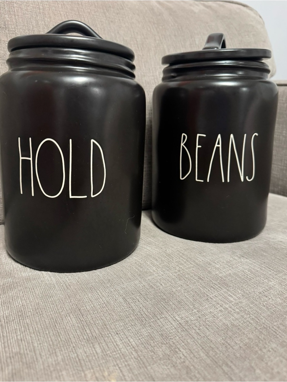 Rae Dunn set of two Black 'HOLD' and 'BEANS' Ceramic Canisters